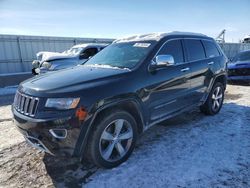 Salvage cars for sale from Copart Kansas City, KS: 2014 Jeep Grand Cherokee Overland