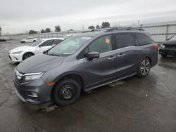 Honda Odyssey salvage cars for sale: 2018 Honda Odyssey Elite