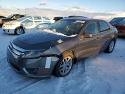 Salvage cars for sale from Copart Nisku, AB: 2010 Ford Fusion SEL