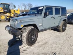 Jeep salvage cars for sale: 2014 Jeep Wrangler Unlimited Sahara