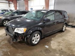 2014 Dodge Grand Caravan SE en venta en Lansing, MI