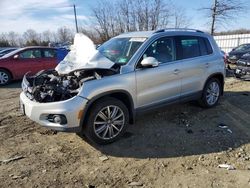 Volkswagen salvage cars for sale: 2014 Volkswagen Tiguan S