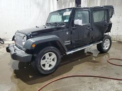 Salvage cars for sale from Copart Central Square, NY: 2012 Jeep Wrangler Unlimited Sport