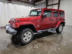 Salvage cars for sale from Copart Rogersville, MO: 2011 Jeep Wrangler Unlimited Sahara