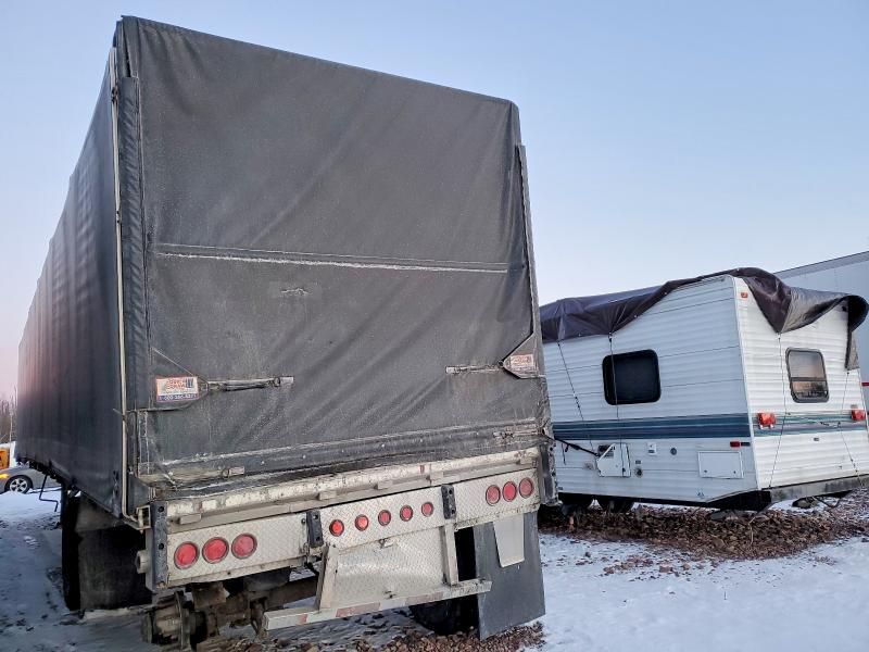 1997 Reitnouer Side Curtain Flatbed Trailer