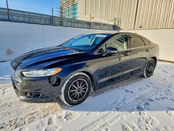 Salvage cars for sale from Copart Nisku, AB: 2015 Ford Fusion Titanium