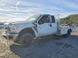 Salvage Trucks for sale at auction: 2014 Ford F350 Super Duty Flatbed Truck