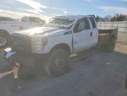 Salvage trucks for sale at Wilmer, TX auction: 2014 Ford F350 Super Duty Flatbed Truck