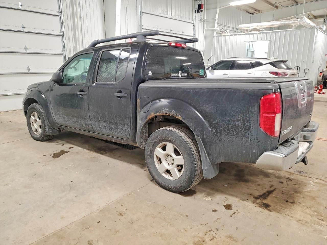2005 Nissan Frontier Crew cab le