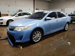 Salvage cars for sale from Copart Elgin, IL: 2012 Toyota Camry Hybrid