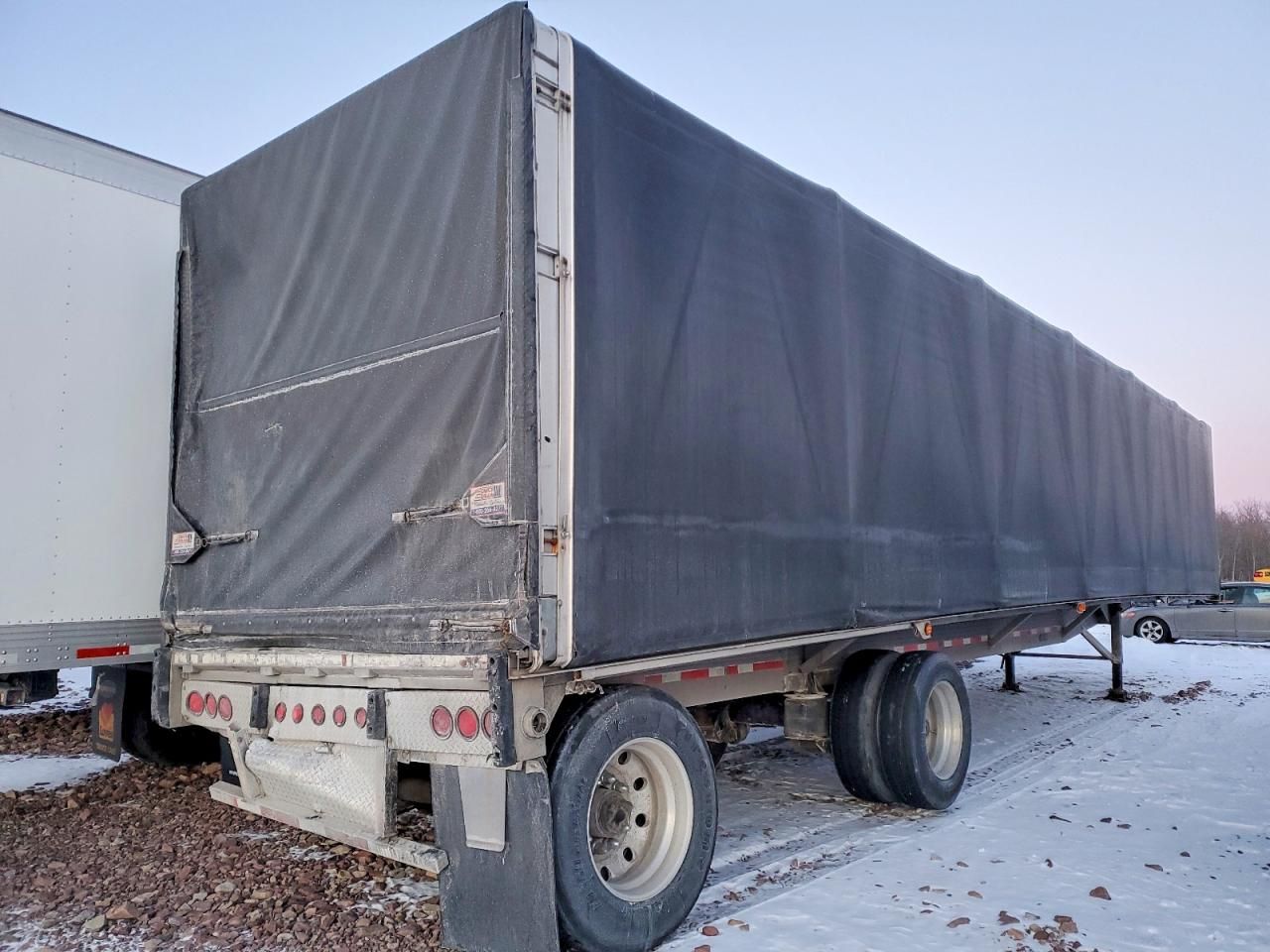 1997 Reitnouer Side Curtain Flatbed Trailer