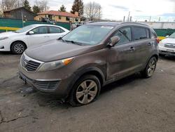 KIA salvage cars for sale: 2011 KIA Sportage lx