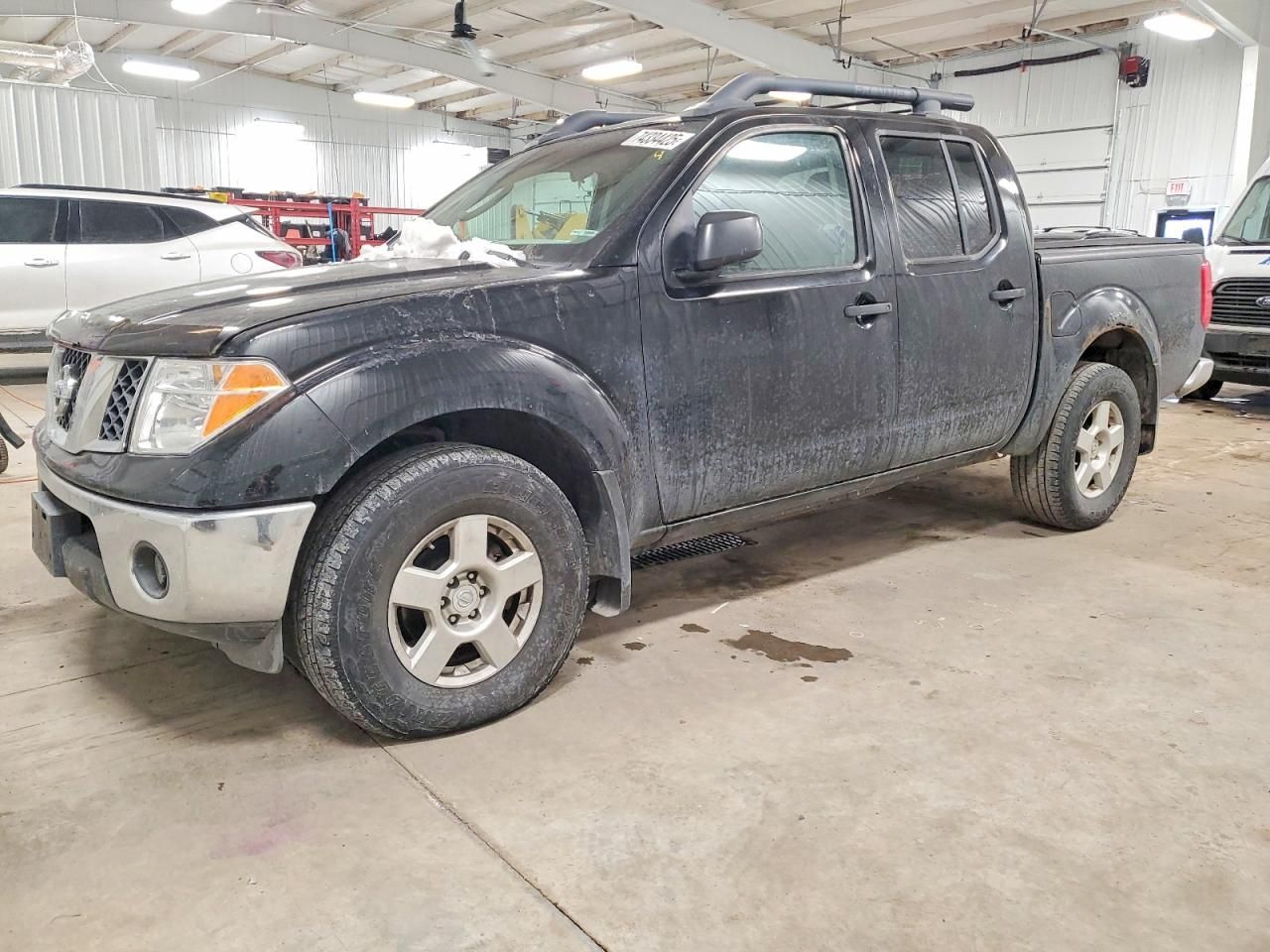 2005 Nissan Frontier Crew cab le