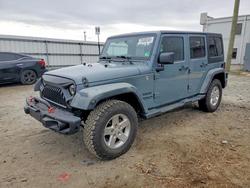 Jeep salvage cars for sale: 2014 Jeep Wrangler Unlimited Sport