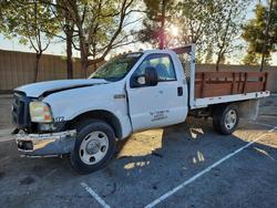 Ford salvage cars for sale: 2006 Ford F350 Super Duty Flatbed Truck