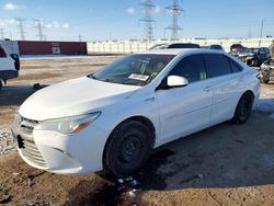 Salvage cars for sale from Copart Elgin, IL: 2016 Toyota Camry Hybrid