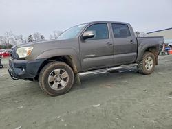 Salvage cars for sale from Copart Spartanburg, SC: 2013 Toyota Tacoma Double Cab Prerunner