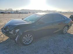 Salvage cars for sale from Copart Houston, TX: 2016 Toyota Camry Hybrid