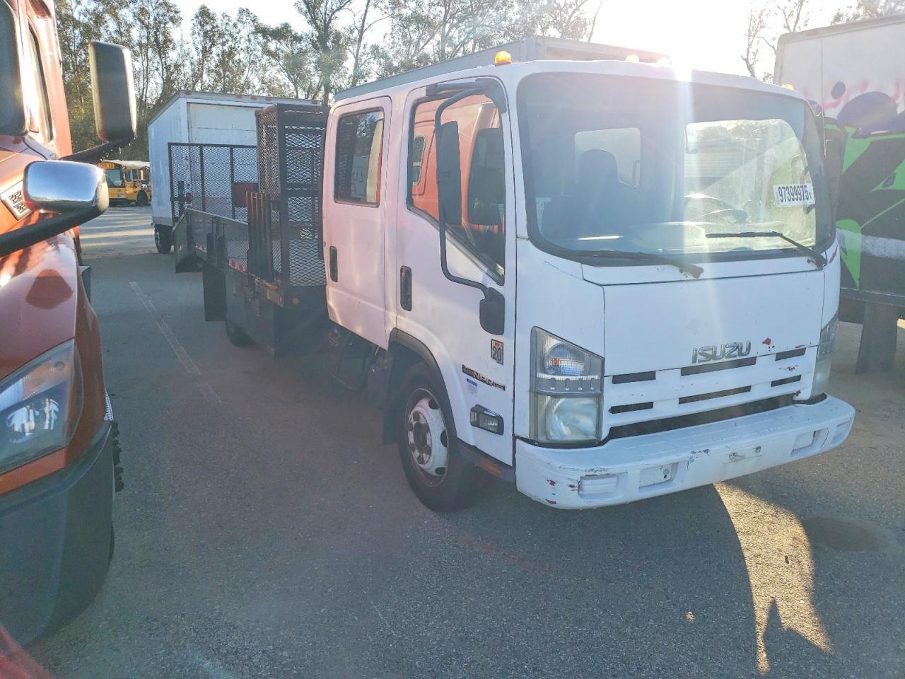 2009 Isuzu NPR Crew Cab Flatbed Truck