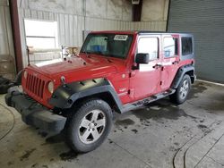 Salvage cars for sale from Copart Helena, MT: 2011 Jeep Wrangler Unlimited Sahara