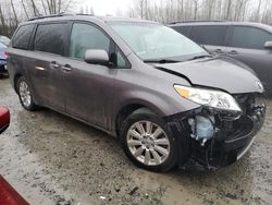 Salvage cars for sale from Copart Arlington, WA: 2011 Toyota Sienna XLE