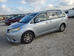 Toyota Sienna xle salvage cars for sale: 2014 Toyota Sienna XLE