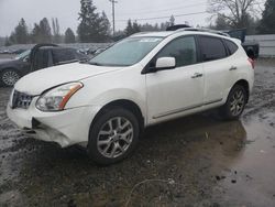 Salvage cars for sale from Copart Graham, WA: 2011 Nissan Rogue S