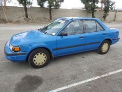 Mazda salvage cars for sale: 1991 Mazda Protege DX