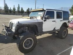 Salvage cars for sale from Copart Rancho Cucamonga, CA: 2014 Jeep Wrangler Unlimited Sport