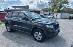 Vehiculos salvage en venta de Copart Orlando, FL: 2011 Jeep Grand Cherokee Laredo