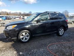 Subaru Forester salvage cars for sale: 2014 Subaru Forester 2.5I Limited