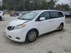 Toyota Sienna xle salvage cars for sale: 2014 Toyota Sienna XLE