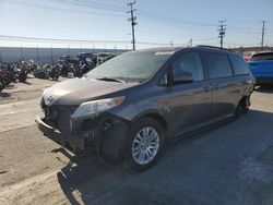 Salvage cars for sale from Copart Sun Valley, CA: 2014 Toyota Sienna XLE