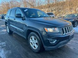 Jeep Grand Cherokee salvage cars for sale: 2014 Jeep Grand Cherokee Laredo