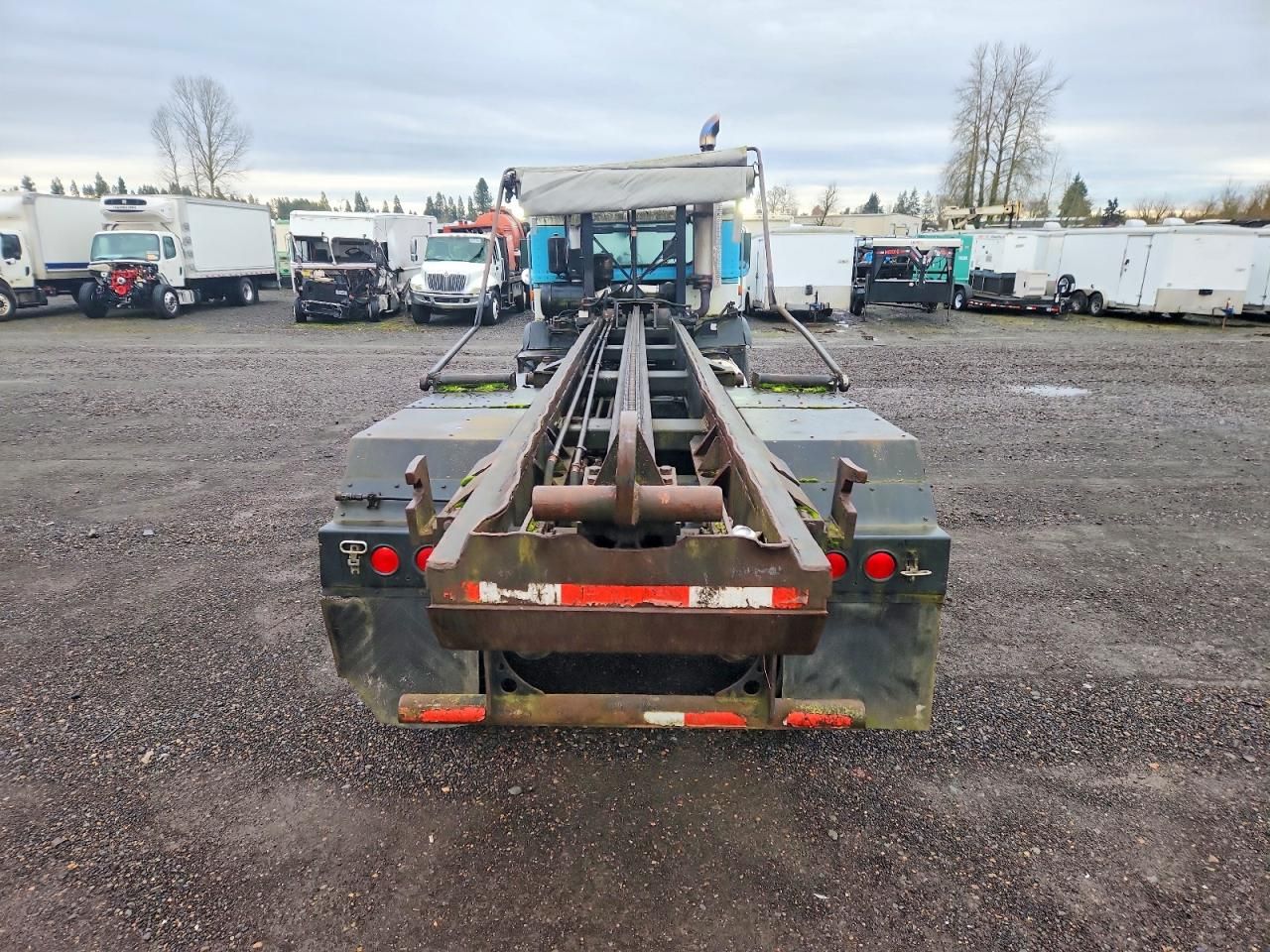 1997 Peterbilt 320 ROLL-OFF Container Truck
