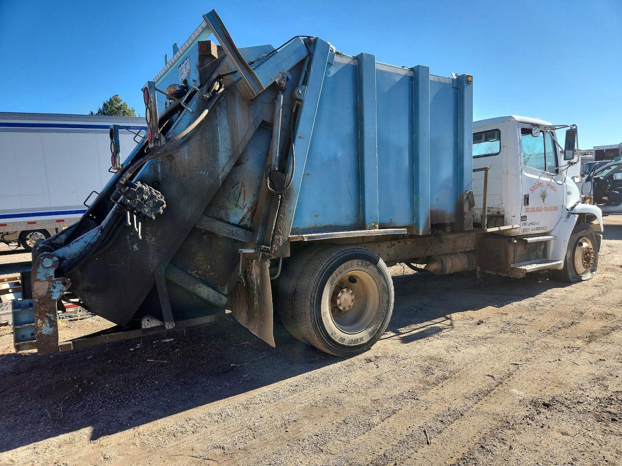 2002 Freightliner FL70 Refuse Truck