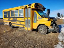 Salvage trucks for sale at Nisku, AB auction: 2011 Chevrolet 2011 Thomas Minotour G3500-School Bus