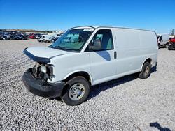 Salvage trucks for sale at Mcfarland, WI auction: 2014 Chevrolet Express 2500 Cargo Delivery Van