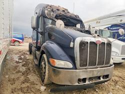 Salvage trucks for sale at Grand Prairie, TX auction: 2011 Peterbilt 387