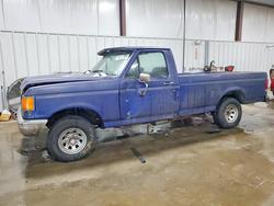 Salvage trucks for sale at West Mifflin, PA auction: 1987 Ford F150