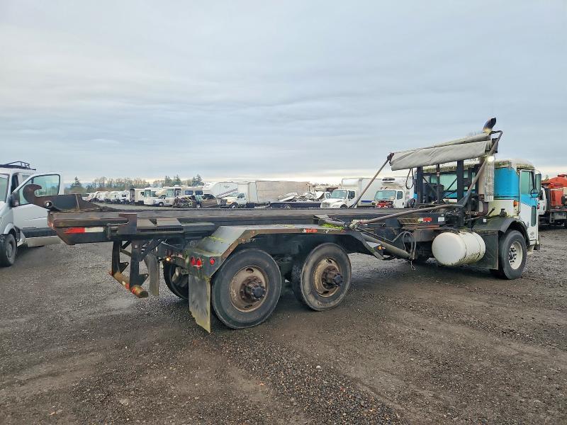 1997 Peterbilt 320 ROLL-OFF Container Truck
