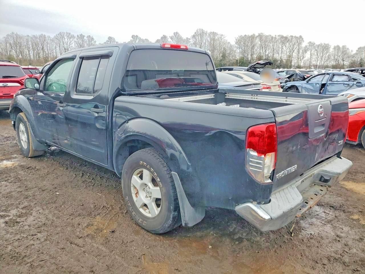 2006 Nissan Frontier Crew cab le