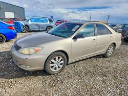 Salvage cars for sale from Copart Magna, UT: 2003 Toyota Camry xle