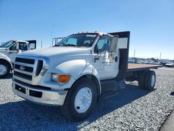 Salvage trucks for sale at Jacksonville, FL auction: 2013 Ford F650 Super Duty Flatbed Truck