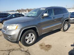 Jeep salvage cars for sale: 2011 Jeep Grand Cherokee Laredo