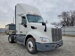 Salvage cars for sale from Copart Rogersville, MO: 2018 Peterbilt 579 Semi Truck