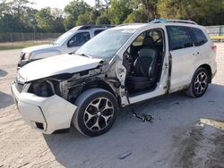 Salvage cars for sale from Copart Fort Pierce, FL: 2014 Subaru Forester 2.0XT Premium