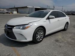 Salvage cars for sale from Copart Sun Valley, CA: 2017 Toyota Camry Hybrid