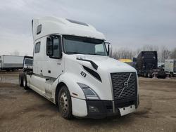 Salvage trucks for sale at Elgin, IL auction: 2022 Volvo VNL Semi Truck