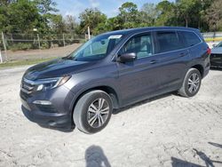 Salvage cars for sale from Copart Fort Pierce, FL: 2017 Honda Pilot EXL